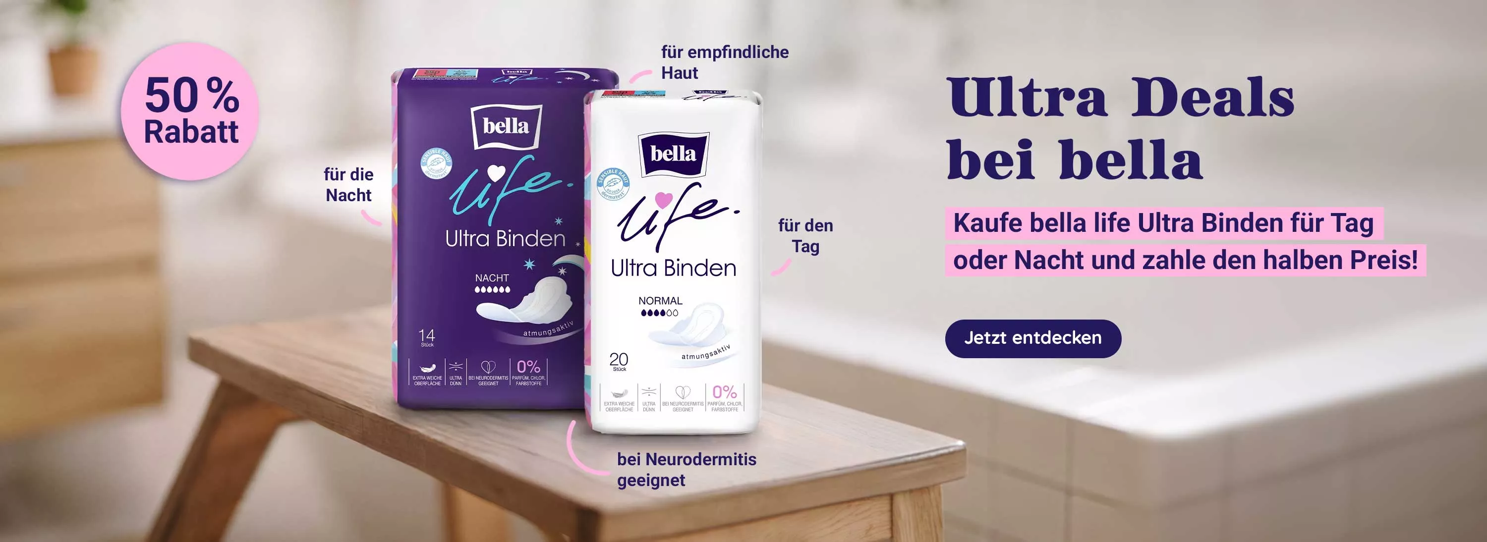 Ultra Binden auf Tisch mit Badewanne im Hintergrund